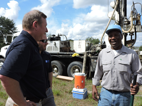 Tommy-and-Tommy-Jr-talk-to-Charles-about-his-new-well